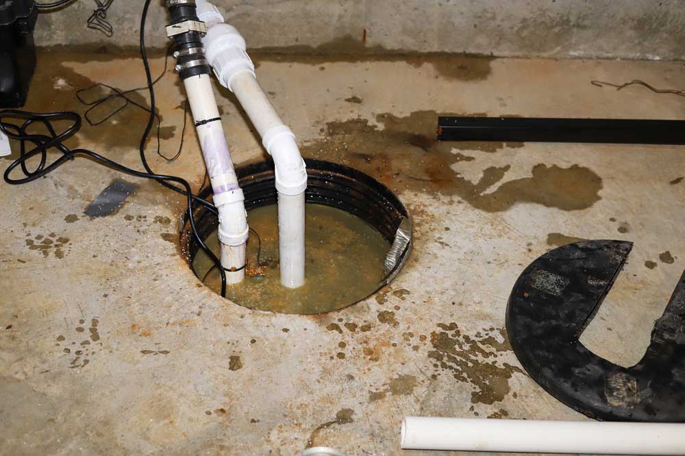 sump pump in a home basement-plumbing repair